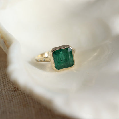 Custom Emerald and Diamond Ring